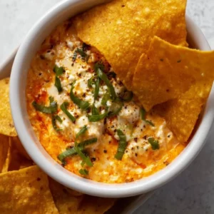 Creamy Buffalo Cottage Cheese Dip served with vegetables and chips