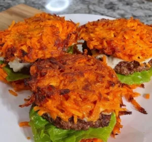 Delicious carrot bun cottage cheese burgers served on a plate