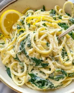 Zesty lemon ricotta and spinach pasta served in a bowl